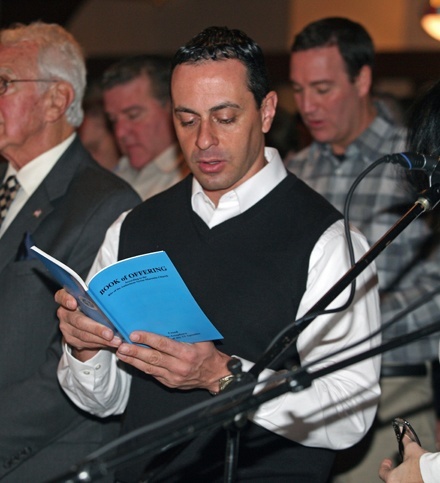 Sary Mabjish, a member of the choir at Our Lady of Lebanon Maronite Catholic Church in Miami, sings during the Mass.