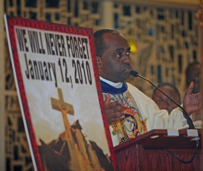 Father Reginald Jean-Mary, pastor of Notre Dame d'Haiti, preaches the homily during the Mass.