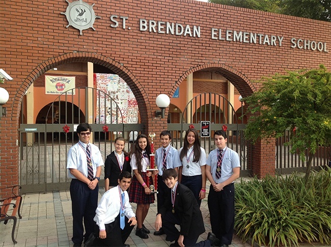 St. Brendan Elementary School students, competing Nov. 5 at the Archbishop Coleman Carroll High School Academic Olympics,  won first place in this year's competition.  Pictured, from left, winning team members:  Matthew Taylor, Amberlyn Colina, Sophia Garcia, David Perera, Maria Castillo, and Andrew Gonzalez; bottom row: Javier Ortiz and Robert Valdes.