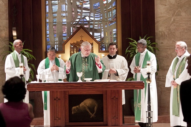 Seen here during the consecration, from left: Bishop Pierre Antoine Paulo, vice-president of the Haitian bishops' conference and bishop of Miami's sister diocese, Port-de-Paix; Archbishop Bernardito Auza, papal nuncio to Haiti; Archbishop Thomas Wenski; Father Richard Vigoa, priest-secretary to Archbishop Wenski; Bishop Chibly Langlois of Les Cayes, president of the Haitian bishops' conference; and Bishop Marc Stenger of the Diocese of Troyes, France.