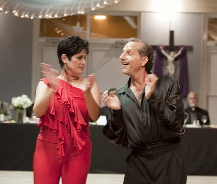 Susan Fernandez of St. Agatha Parish and her partner, Lee Fraum, dance a merengue.