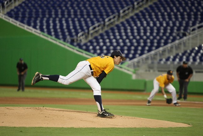 ADOM :: Archbishop throws out first pitch at Marlins game