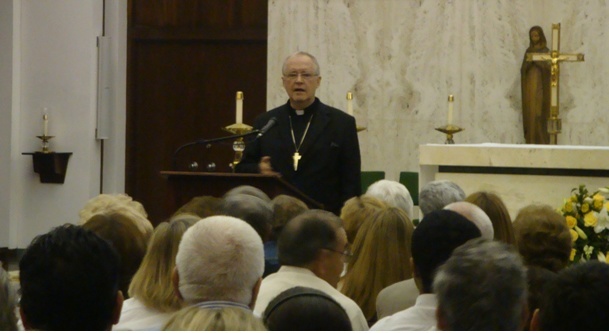 Cardinal Paul Cordes speaks on the New Evangelization April 27 to a large group of people gathered at St. John Vianney College Seminary in Miami.