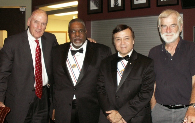 Pictured at the Knights of Columbus dinner, from left: Dr. David Butler, president of the board of the CRUDEM Foundation; Richard Cumberland, deputy Grand Knight of the Marian Council; Barry Ekle, Faithful Navigator of the Marian Assembly; and Tim Traynor, facility director for the CRUDEM Foundation.