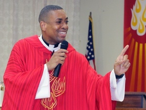 Father Steve Ransome of Our Lady of Mt. Carmel and St. Anthony Churches in Trinidad, addresses the congregation at Christ the King Church.