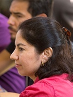 Eva Gonzalez, Hispanic ministry director for the Archdiocese of Louisville, Ky., listens during a break-out session for Hispanic ministry leaders at a regional Encuentro held Oct 17-20 in St. Augustine, Fla.