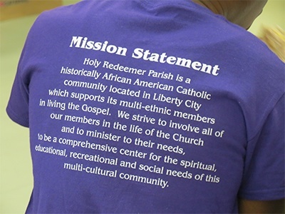 Most the teens at the conference wore purple shirts identifying them as members of Holy Redeemer Parish in Liberty City.