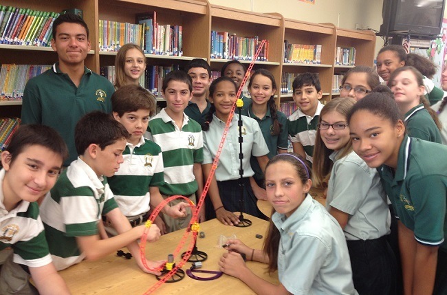 Mary Help of Christians School's seventh graders pose for a photo during their experiment with "roller coaster" math. From left: Kevin Milakovic, Nicolas Martin, Christopher Diaz, Martin Nido, Nicolas Yovino, Emily Pallack, Anthony Mandravellos, Adriana Diaz, Jasmine Winchester, Ashley Ruf, David Morales, Camryn Smalling, Kate Spoor, Emily Solanet, Kailey Norusis, Izabelle Victor and Madison Grushoff.