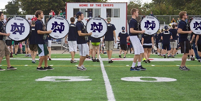 The marching band for the Fighting Irish rehearse their performance of the theme song from "Back to the Future" on the football field at Cardinal Gibbons High School.