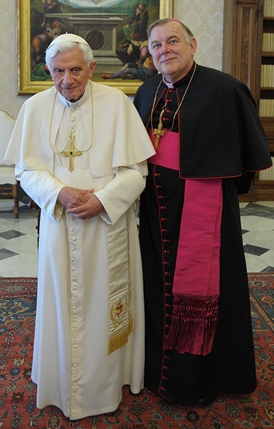 Archbishop Thomas Wenski poses for a picture with Pope Benedict XVI during the ad limina (to the threshold) visit May 11, 2012 to the Holy See. The archbishop went with all the other bishops of Florida and a group of about 30 priests, religious and laity from Miami. The ad limina visit is required of every bishop in the world every five years or so, to report to the Holy See on the state of his diocese.