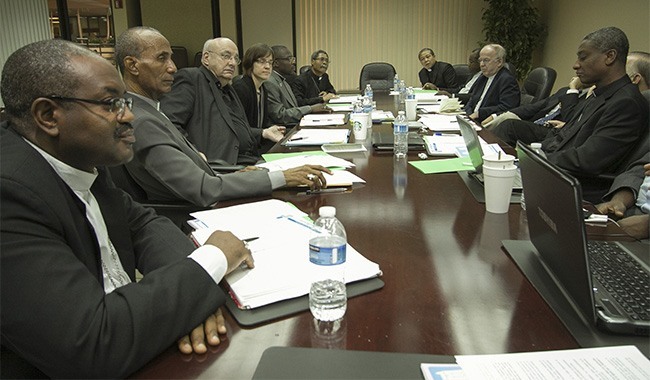 Haitian bishops and priests take part in the discussion during the meeting of  PROCHE,  the Partnership for the Reconstruction of the Church in Haiti. Second from left is Bishop Pierre-Antoine Paulo of Port-de-Paix, Miami's sister diocese.