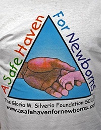 A t-shirt bears the logo of A Safe Haven For Newborns, established by Christ the King parishioner Nick Silverio in memory of his wife, Gloria.