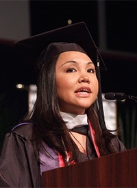 Maria Mercedes Lardizabal, born and raised in the Philippines, speaks at the general graduation for St. Thomas University.