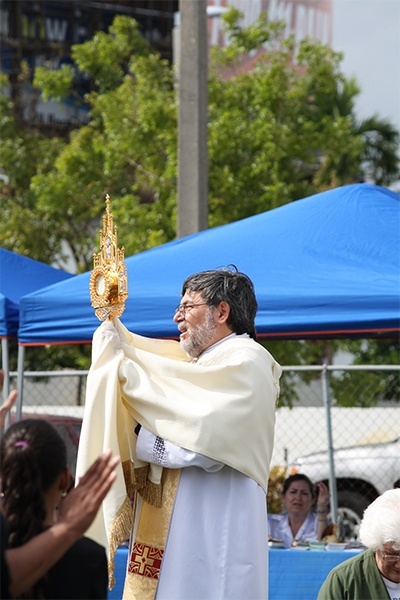 Father Jordi Rivero leads a Eucharistic procession during Holy Hour on the feast of Divine Mercy.