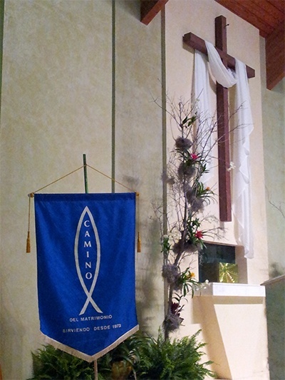 The Camino del Matrimonio banner stands on the altar at St. Timothy parish where the 40th anniversary Mass was celebrated by Piarist Father Rafael Cap, director of SEPI.
