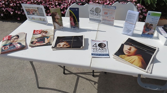 Tables outside Little Flower Church featured pamphlets on the topics of abortion and contraception.