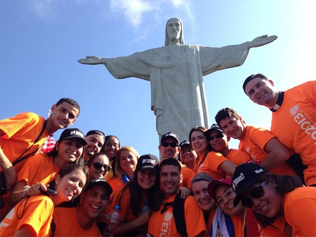 The SEPI group pose underneath the Christ the Redeemer statue overlooking the bay in Rio de Janeiro.