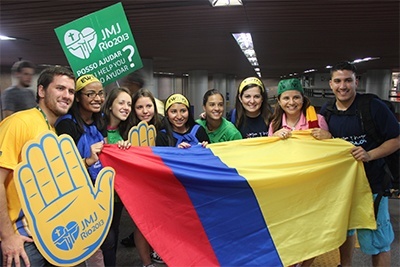 Members of the SEPI group pose with young adults from Colombia.