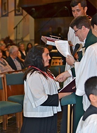 Server Isabella Valdes receives her Guild medal.