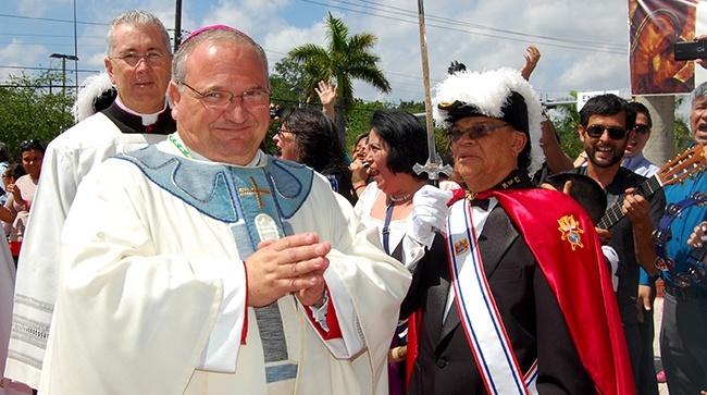 Bishop-designate Peter Baldecchino flashes a smile as he prepares to enter St. Mary Cathedral for the ordination Mass.