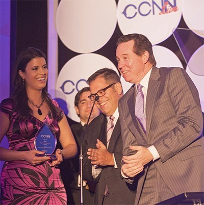 Roxanne Vargas, entertainment reporter, Jose Suarez, creative services director, and John Morales, meteorologist, accept the award for best local news station for NBC-6-WTVJ.