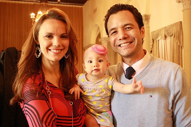 Keynote speaker Leah Darrow poses with her three-month-old baby, Agnes, and her husband, Ricky Soldinie.