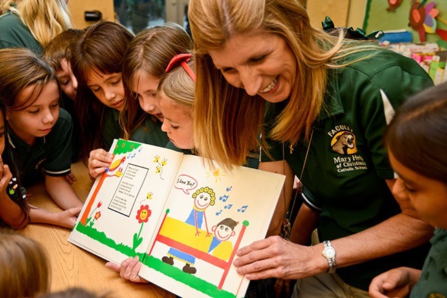 Second grade teacher Mary Suppe helps her Mary Help of Christians students discover the joy of reading.