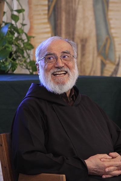 Capuchin Franciscan Father Raniero Cantalamessa, preacher to the papal household since 1980, prepares to speak to a group of about 200 lay people gathered at the Southeast Pastoral Institute (SEPI) in Miami.