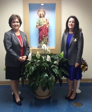 St. Agatha School Principal Maria Glass (left) with Assistant Principal Patricia Hernandez in front of the new statue of St. Agatha that was blessed and placed in the school building.