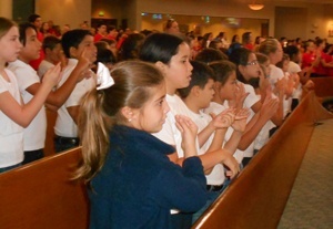 After a Mass in remembrance of September 11, 2001, students from St. Bonaventure School signed and sang "God Bless America."