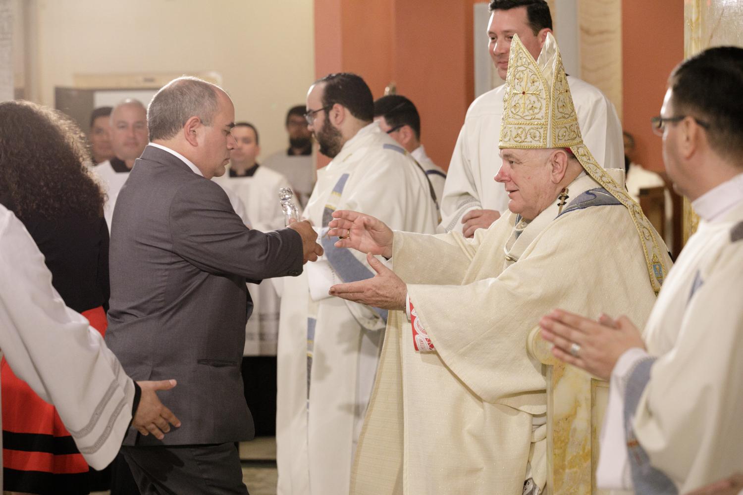 ADOM :: New bishop s family comes from Peru to celebrate ordination